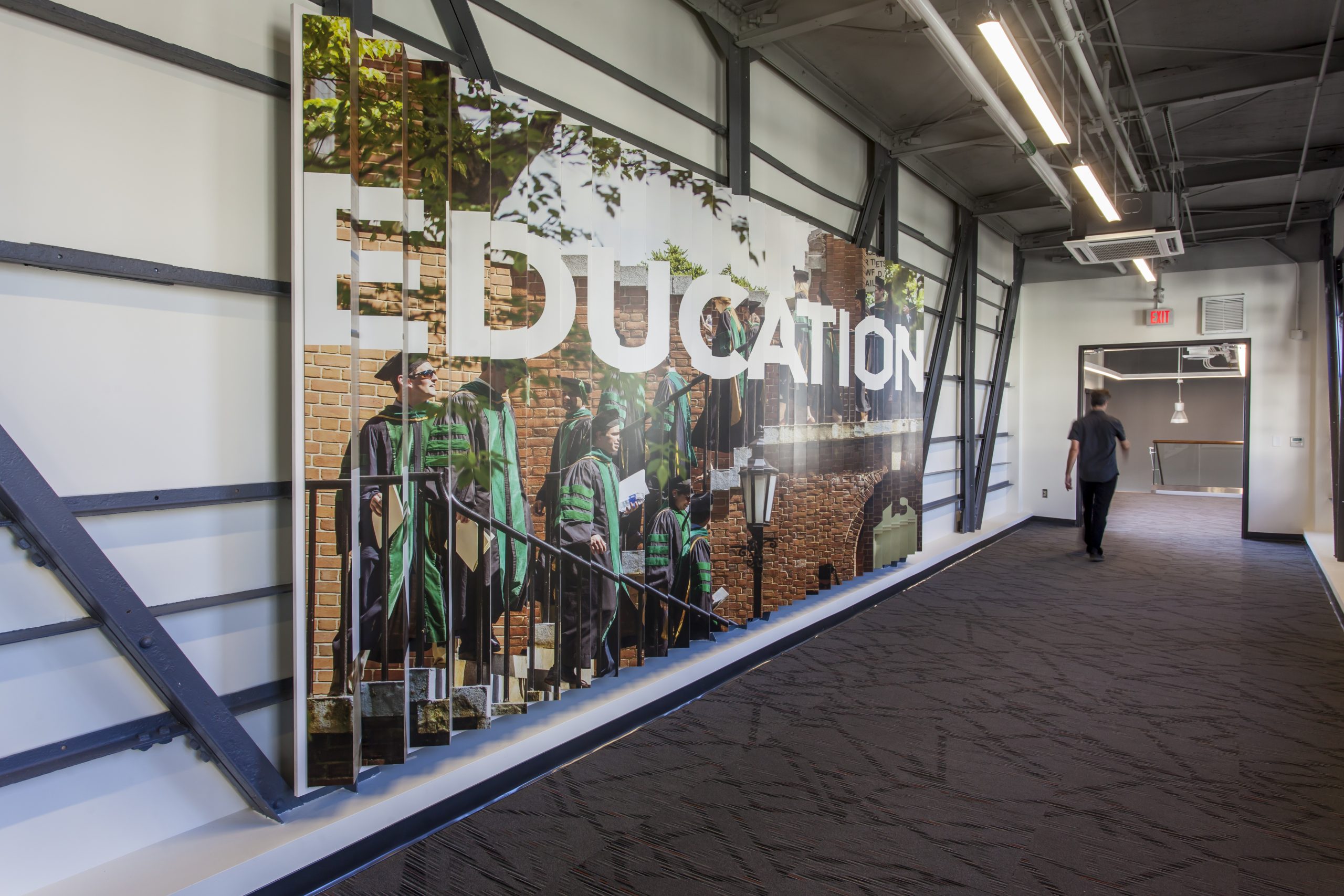 Wall with Graphic that says Education