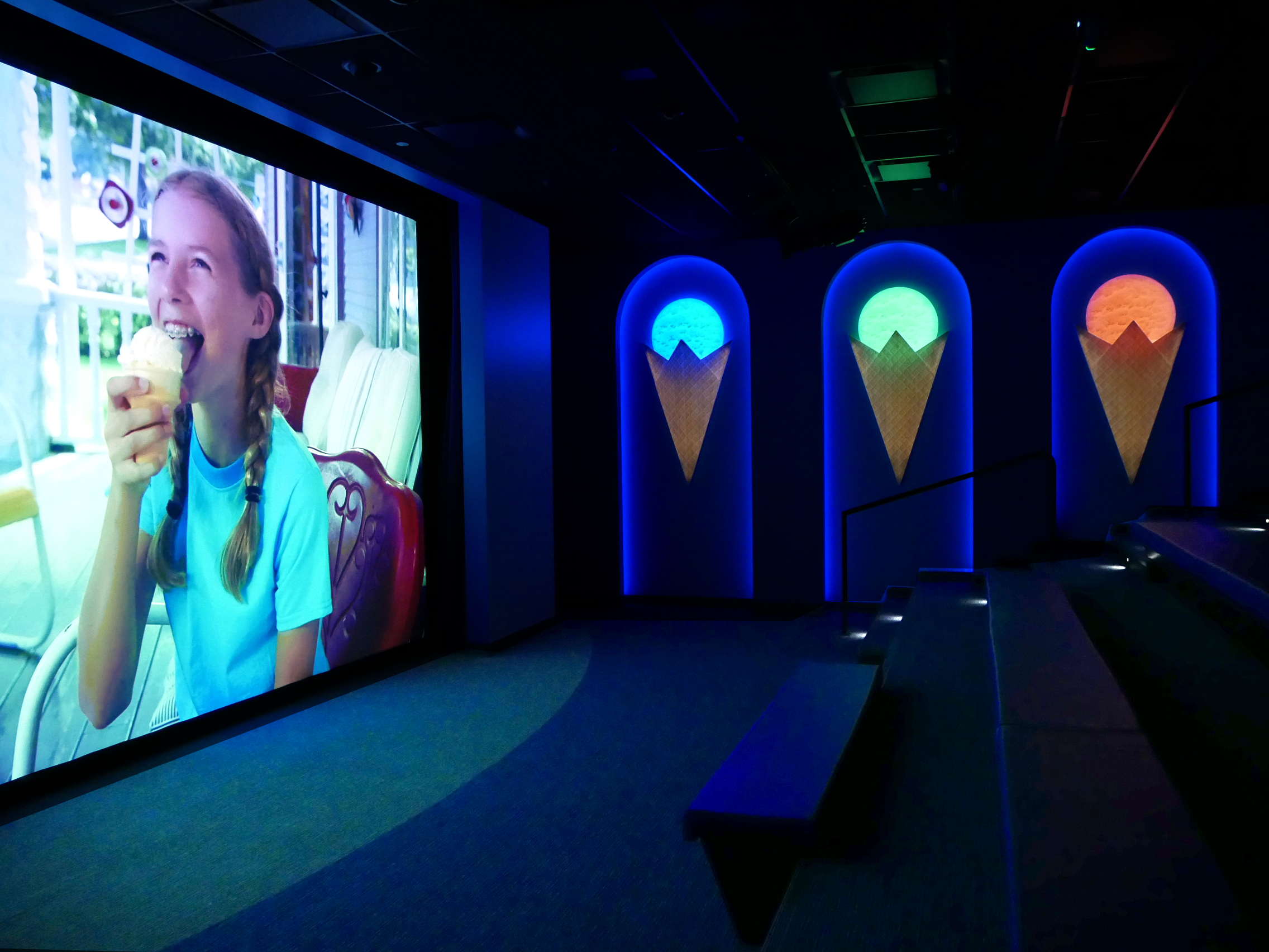 Theater with video of girl eating ice cream